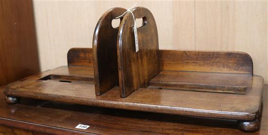 A large adjustable mahogany book carrier, English, c.1840. 30inches long by 13inches deep by 11.5inches high